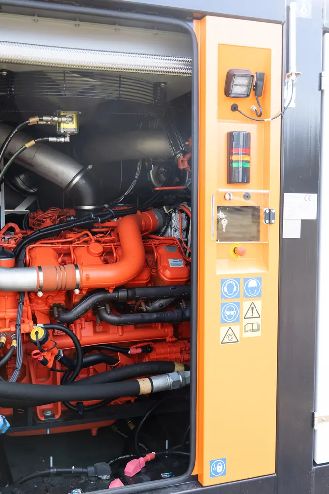 An open support-unit compartment with engine and control equipment.