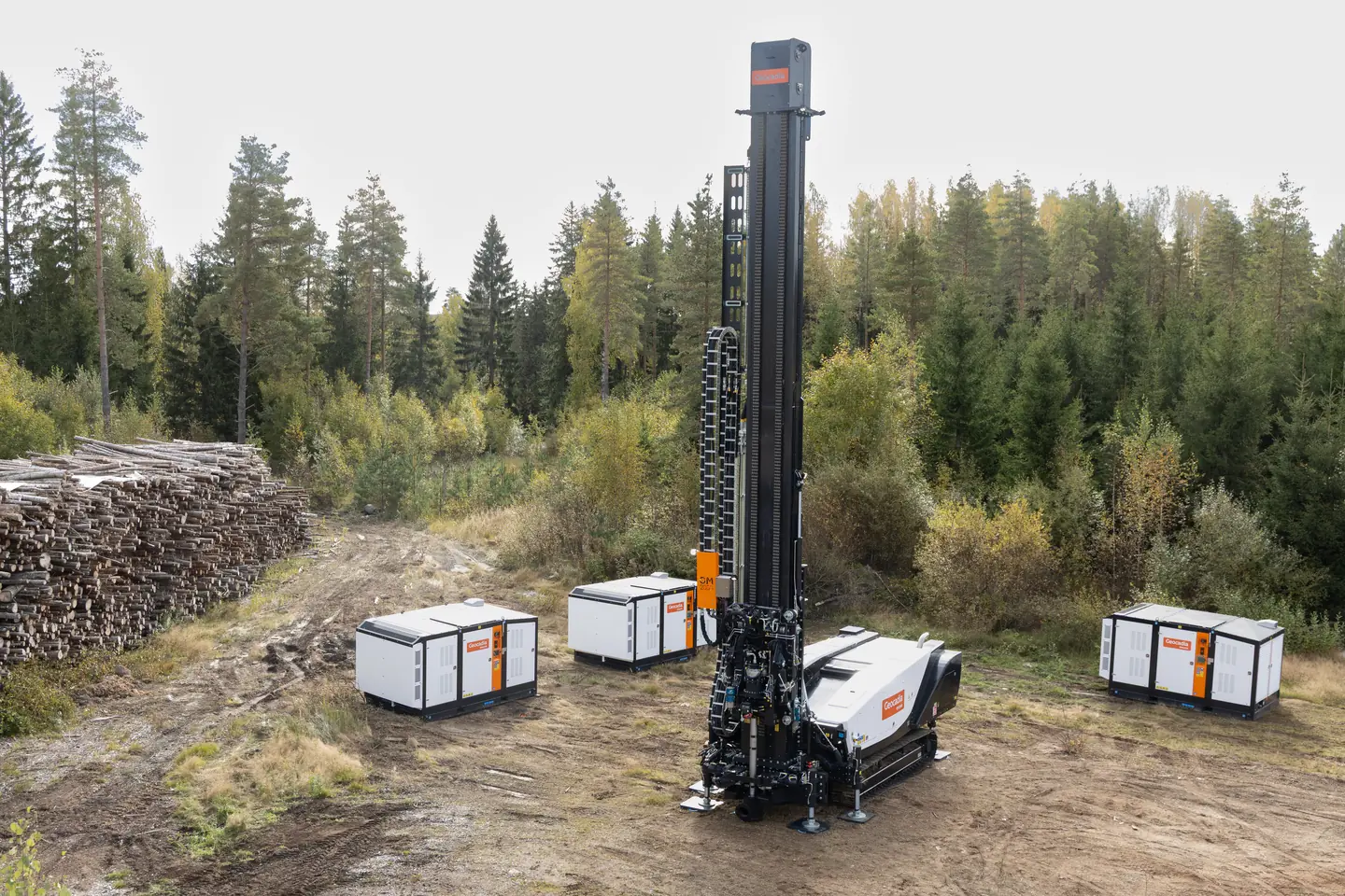 Elevated view of the Geocadia GM2000 rig and three support units