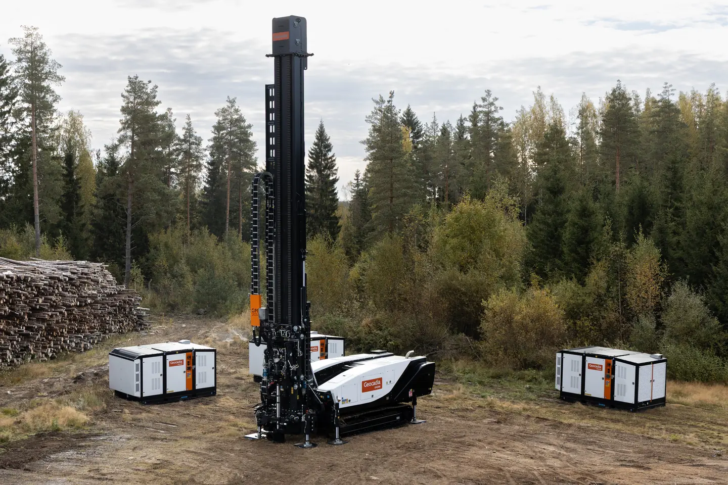Elevated view of the Geocadia GM2000 drilling rig beside separate support units